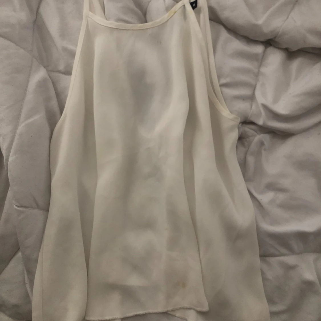 Vit genomskinligt linne