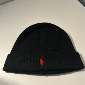 Polo Ralph lauren mössa - En riktigt snygg polo Ralph Lauren mössa i ett mycket bra skick vid fler frågor är det bara att skriva 