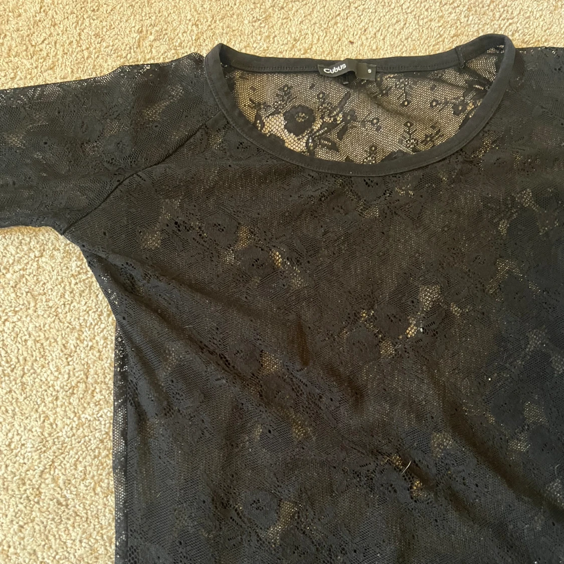  Genomskinlig svart spets