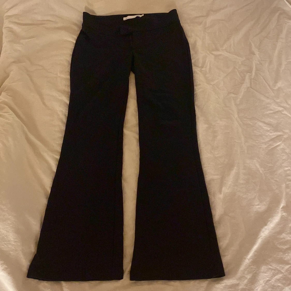Svarta bootcut kostymbyxor från 157 XS
