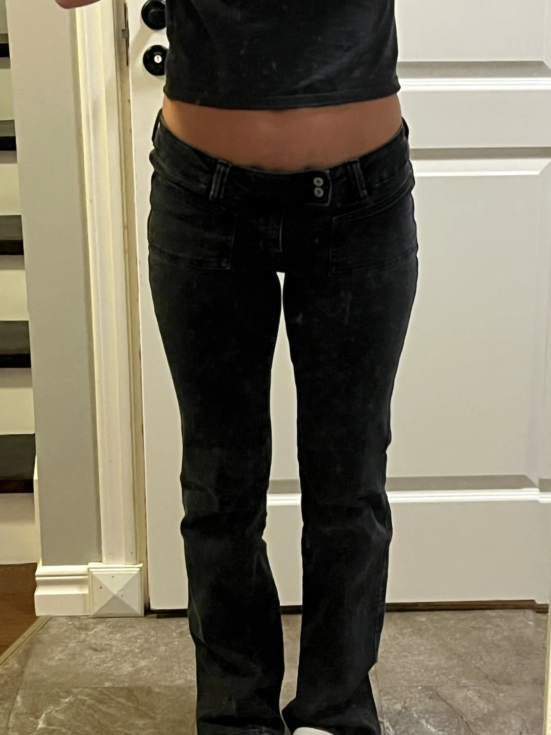 Svarta bootcut jeans låg midja