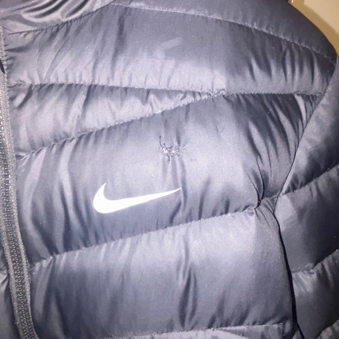 Svart lång dunjacka från Nike - 1