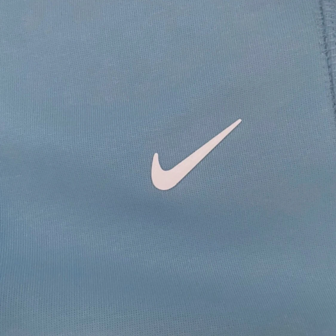 Nike NOCTA ljusblå mjukisbyxor S - 4
