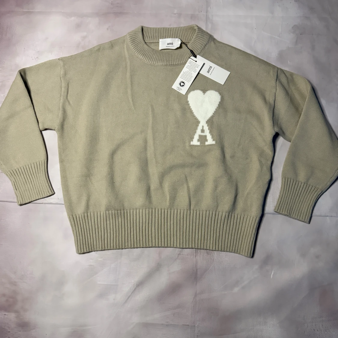 Beige stickad tröja från Ami