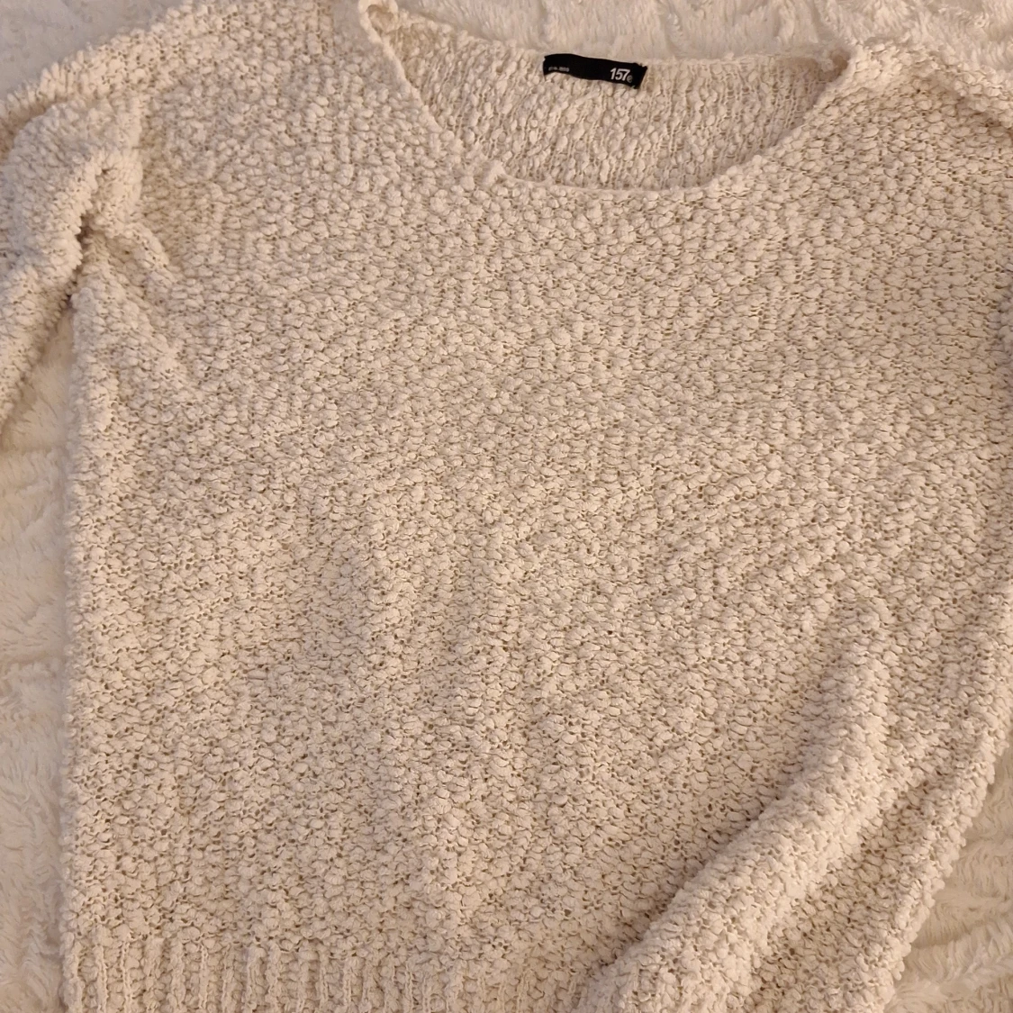 Beige stickad tröja från 157