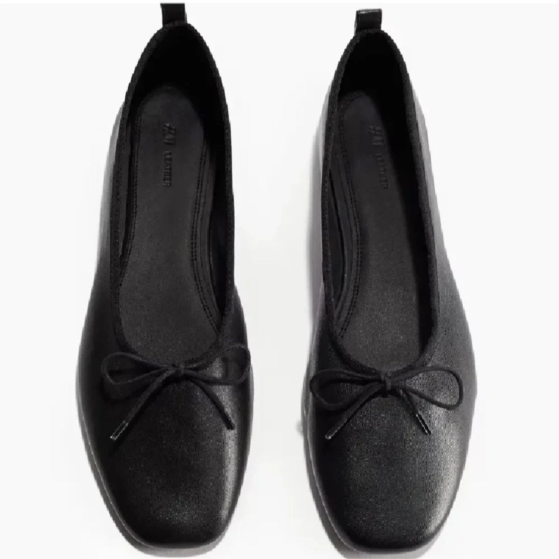 Svarta ballerinaskor i läder