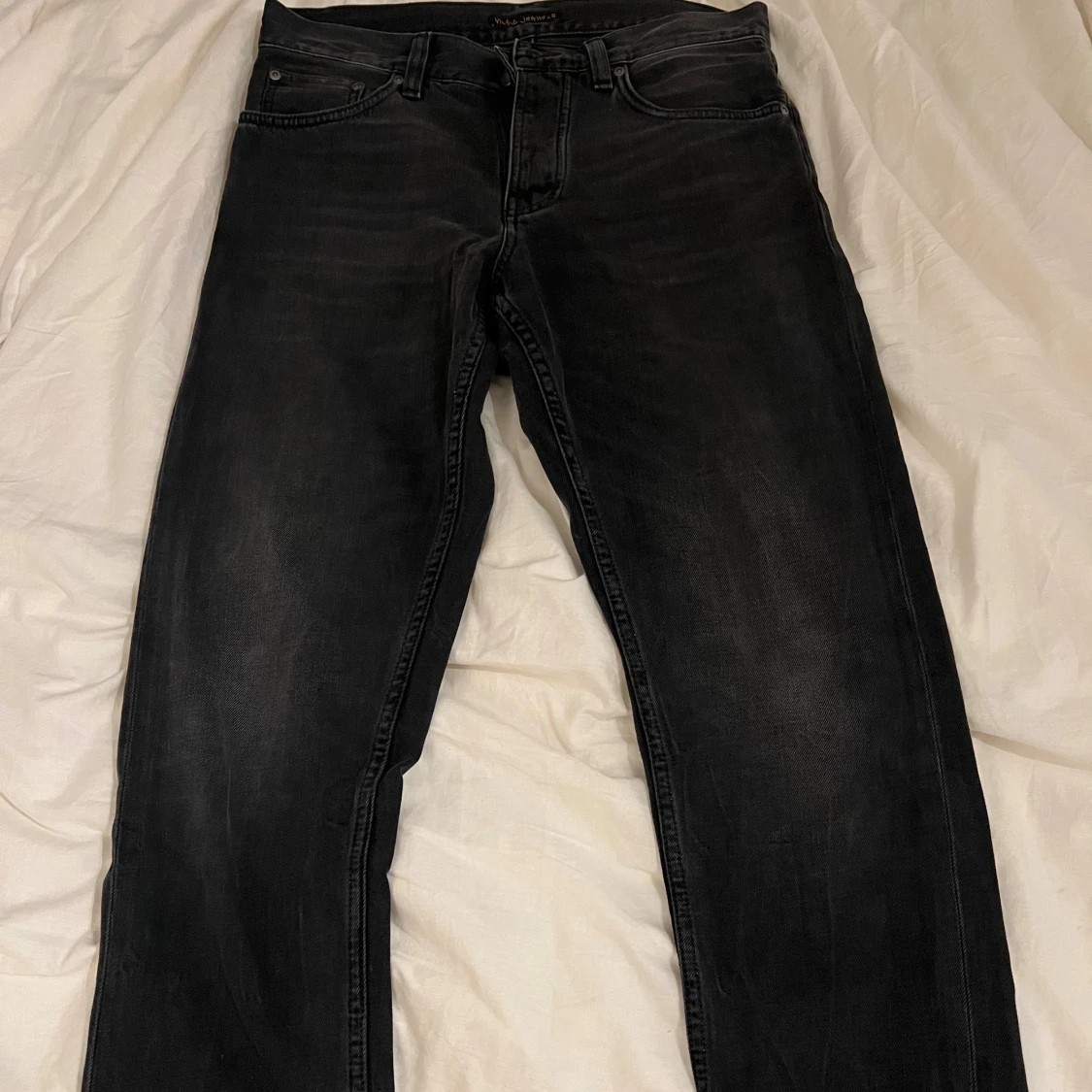 Svarta/mörkgrå NUDIE Jeans 