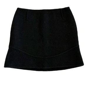 Prada Rare Vintage Mini Wool Skirt - ♡ Beautiful and super soft rare vintage mini wool skirt from Prada. A staple in your closet that keeps you warm while looking chic in the colder weather. ♡ Made in Italy. ♡ Waist: 34 cm ♡ Length in the back: 37 cm ♡ Length in the front: 37 cm 