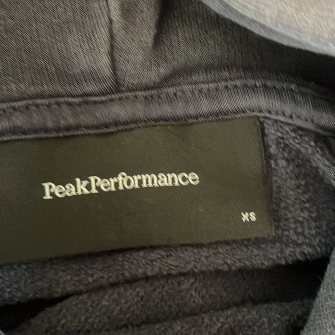 Blå hoodie från Peak Performance XS - 2