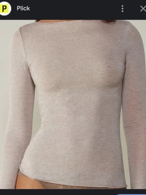 Beige långärmad topp i bomull - Snygg beige långärmad topp från intimissimi 