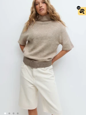 stickad polotröja med kort ärm - skitsnygg stickad tröja med krage och korta armar. Xs använd 3ggr nypris 300kr