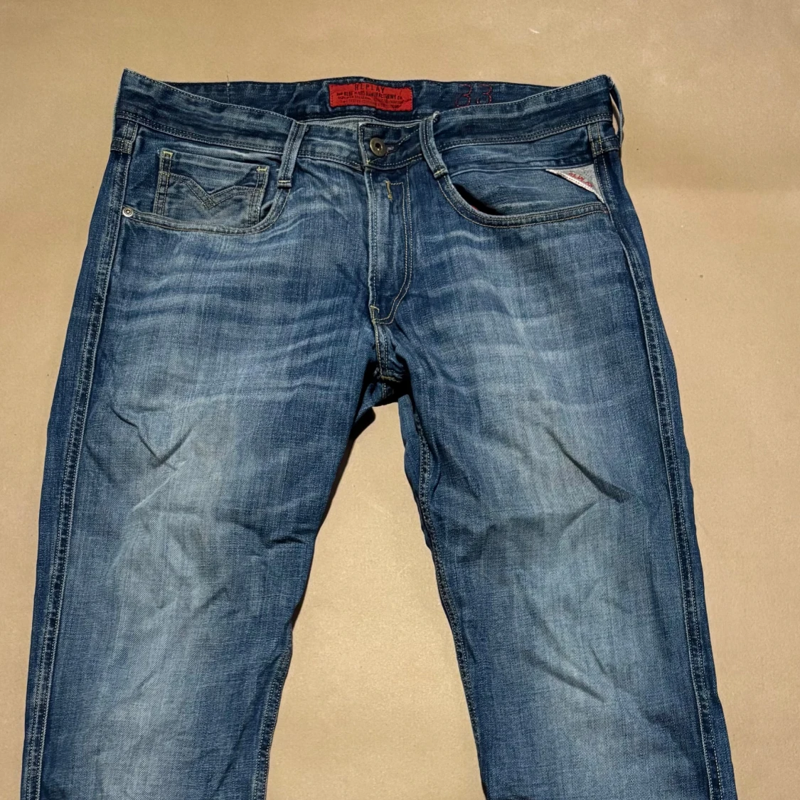 Blå Replay jeans herrmodell