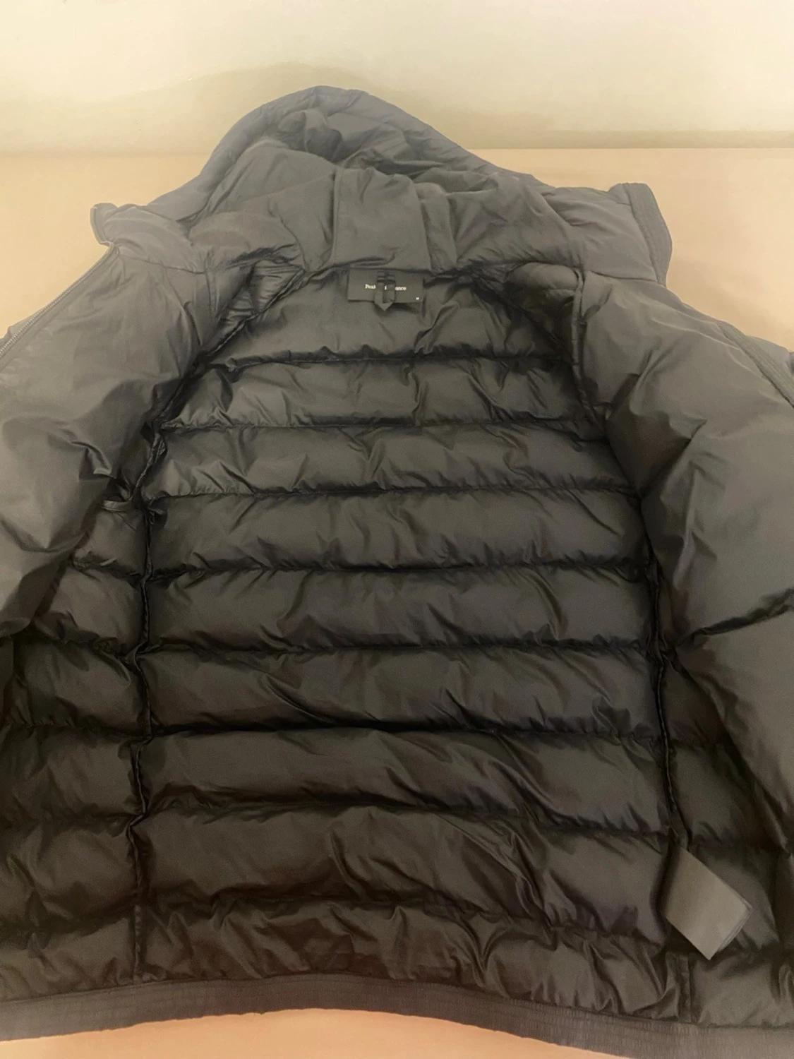 Svart dunjacka Peak Performance M - 1