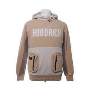 Beige och creme hoodie från Hoodrich - Säljer en snygg hoodie från Hoodrich, köpte den till min lil kusin men den passade inte, oanvänd, storlek S