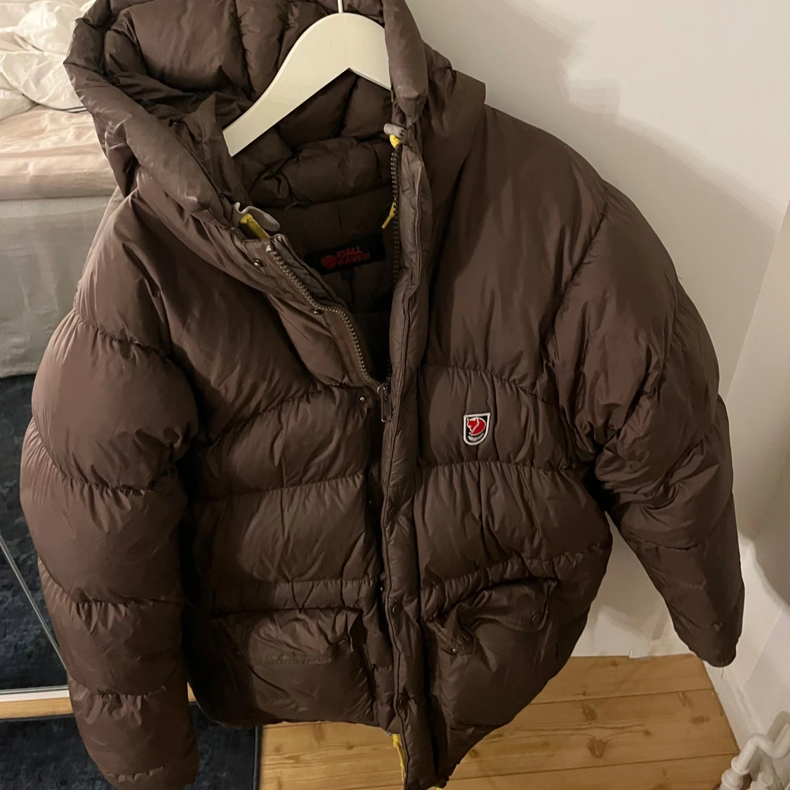 Brun pufferjacka från Fjällräven M