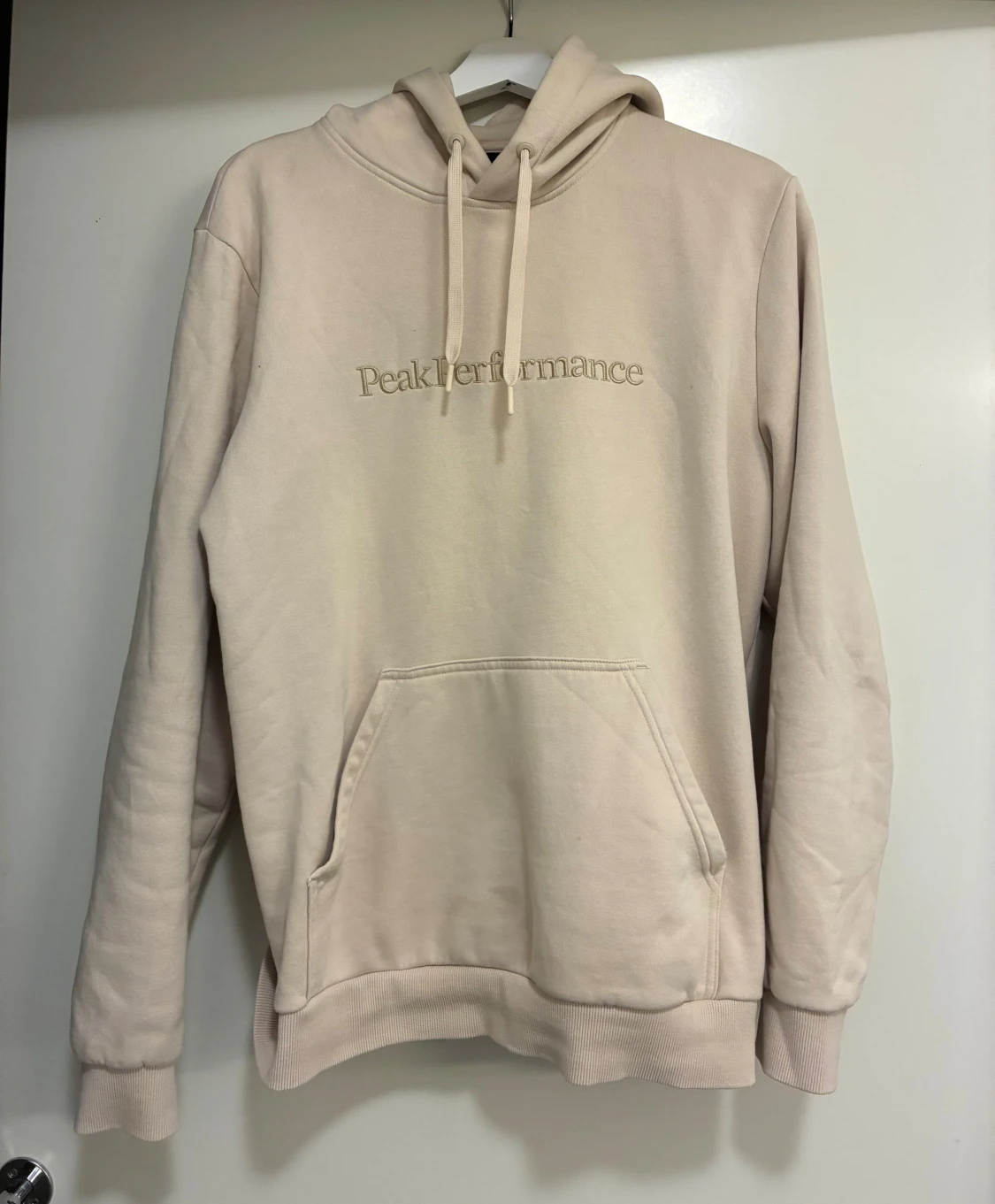 Beige hoodie från Peak Performance S