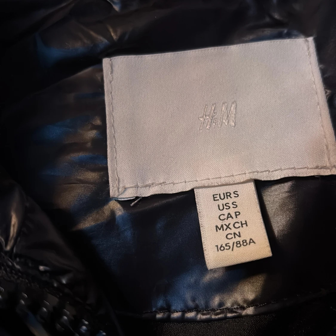 Svart lång dunväst från H&M - 2