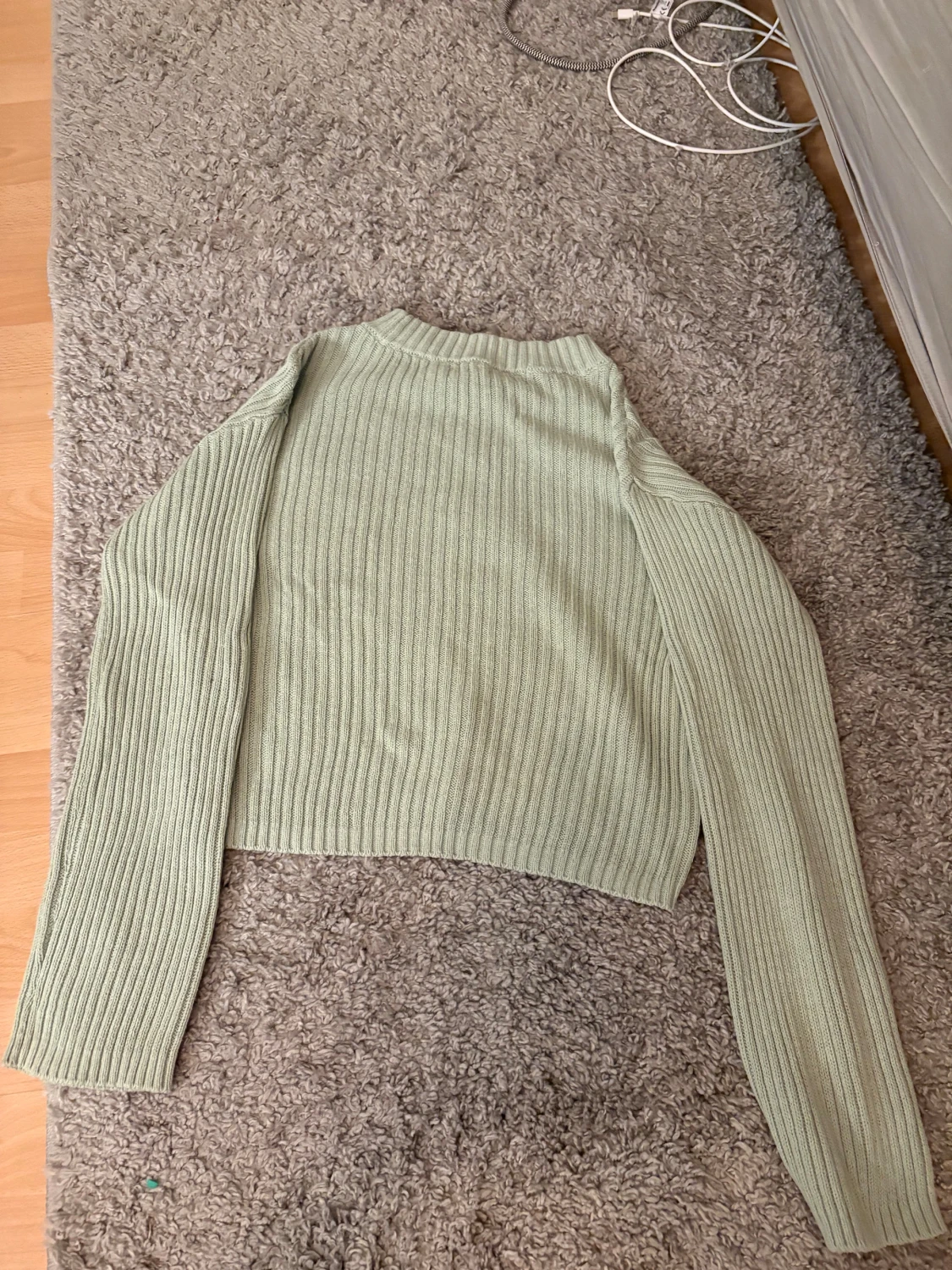 Ljusgrön stickad tröja