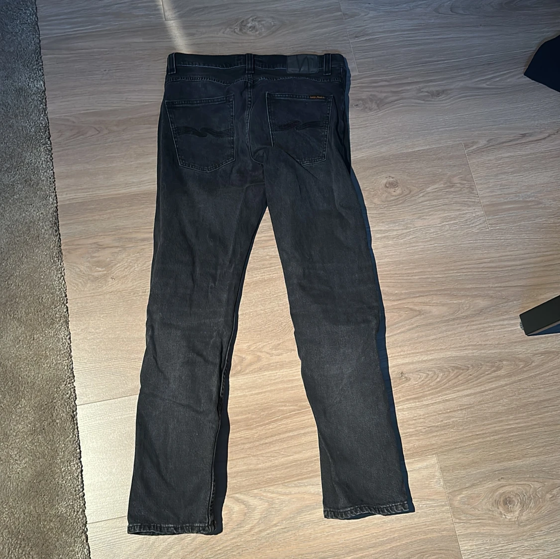 Svarta Nudie Jeans Grim Tim 31/32 - 1