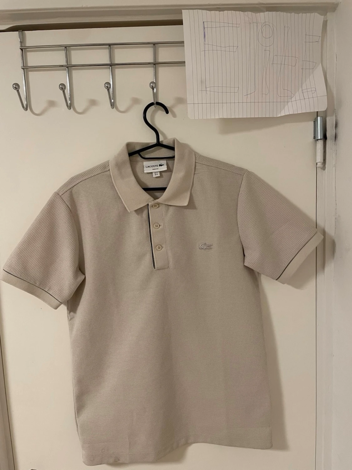 Beige piké Lacoste