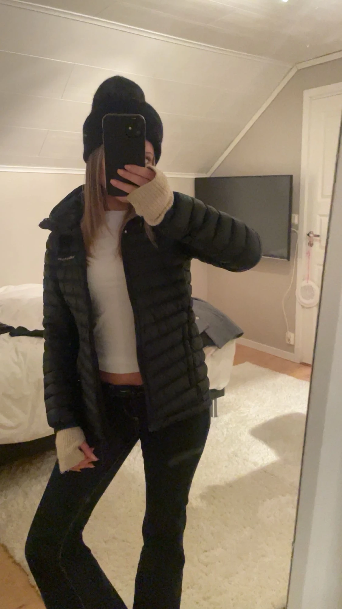 Svart dunjacka Peak Performance