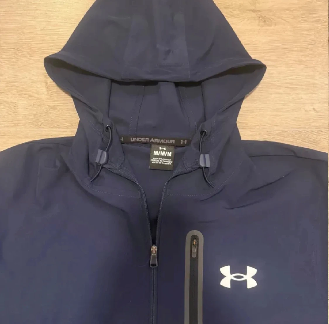 Under Armour vindjacka marinblå/grå
