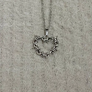 Thorned Love - Striking heart pendant wrapped in thorn-like wire. 50 cm stainless steel chain