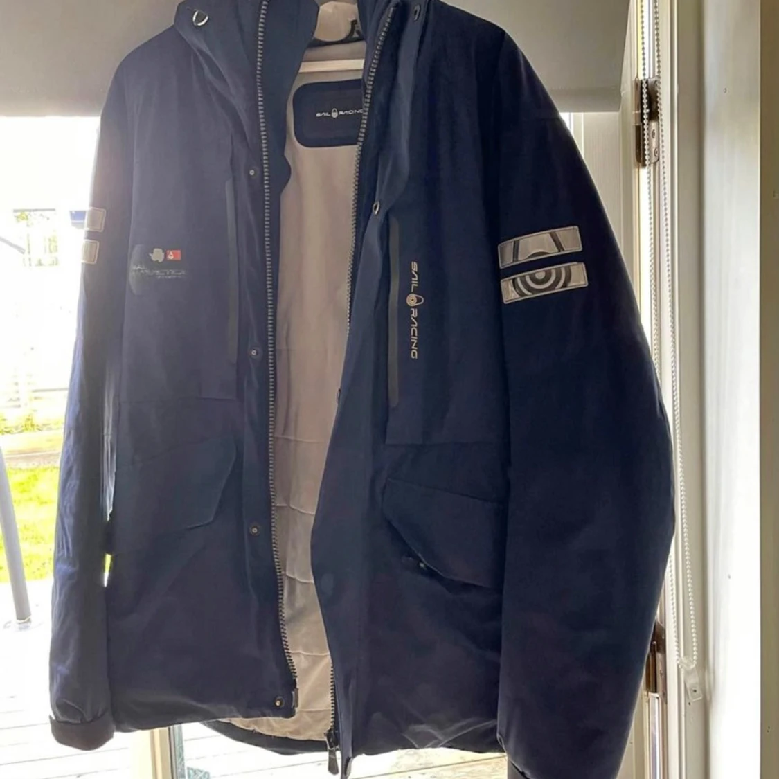 Mörkblå Sail Racing pufferjacka