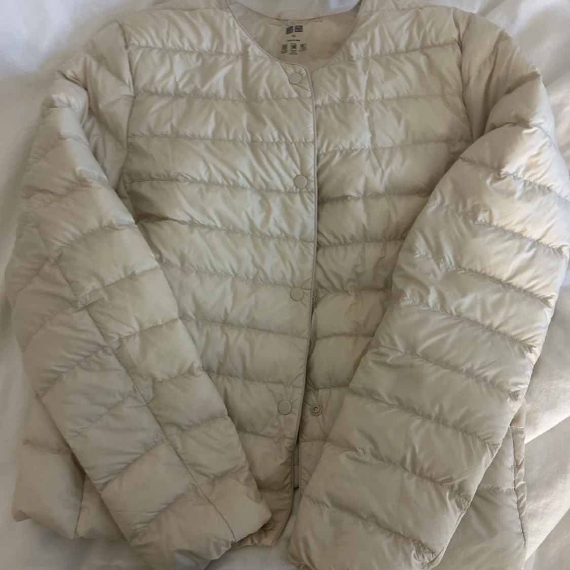 Beige dunjacka från Uniqlo XS - 2