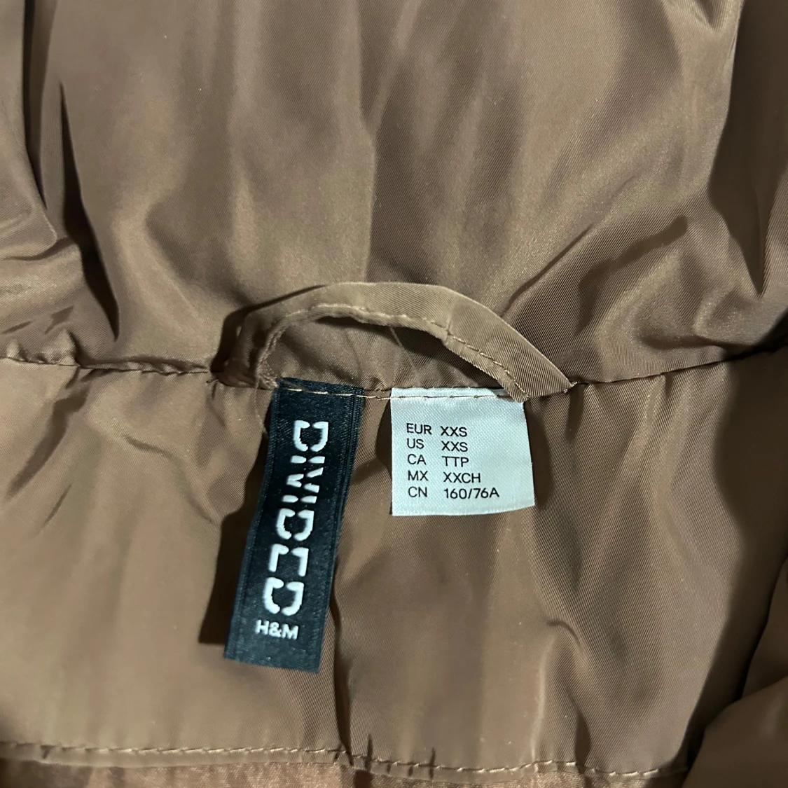 Brun dunväst från H&M  - 2