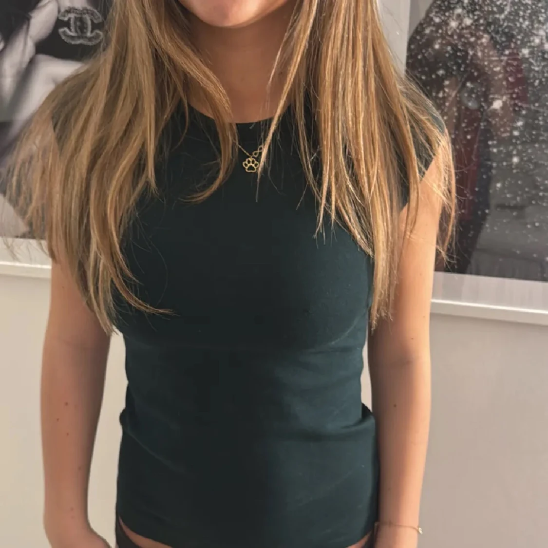 Mörkgrön ärmlös linnetopp