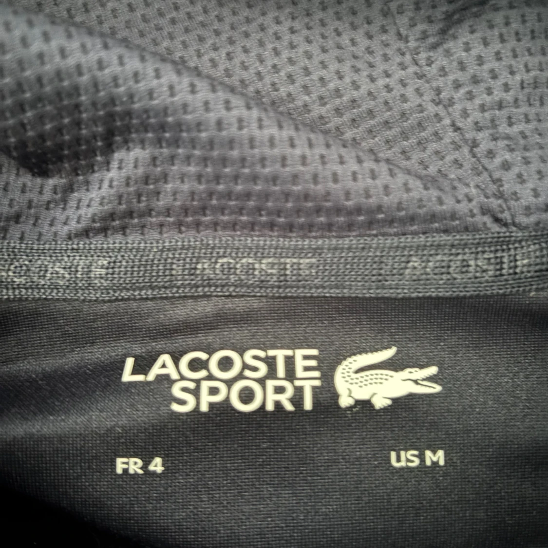 Marinblå hoodie från Lacoste Sport - 1