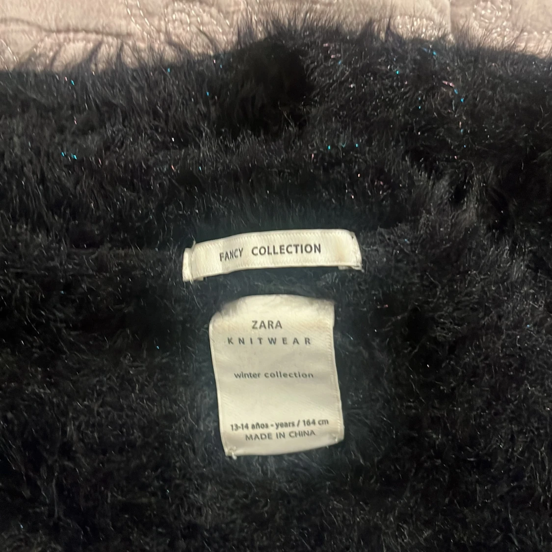 Stickad/festlig tröja