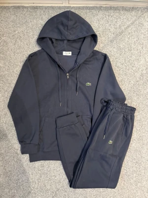 Lacoste navy blue tracksuit - Size M, true to size. Brand new