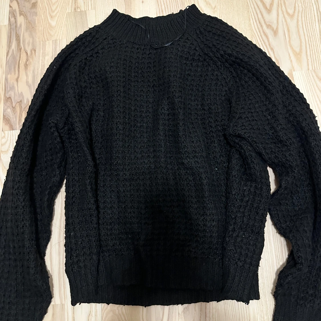 Svart stickad tröja från 157