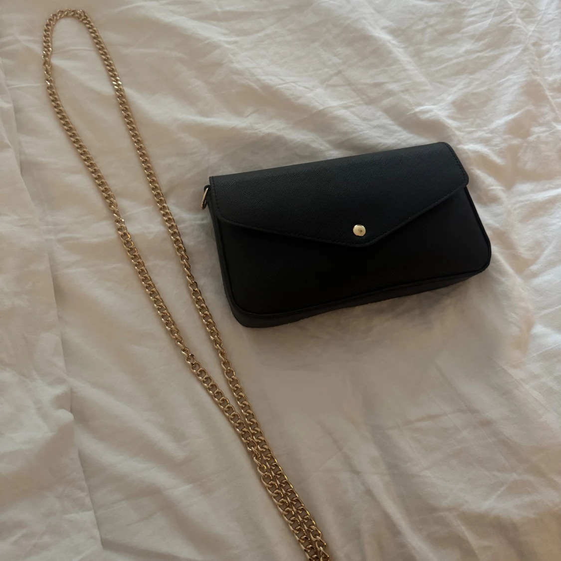 Svart kuvertväska från Don Donna - 2