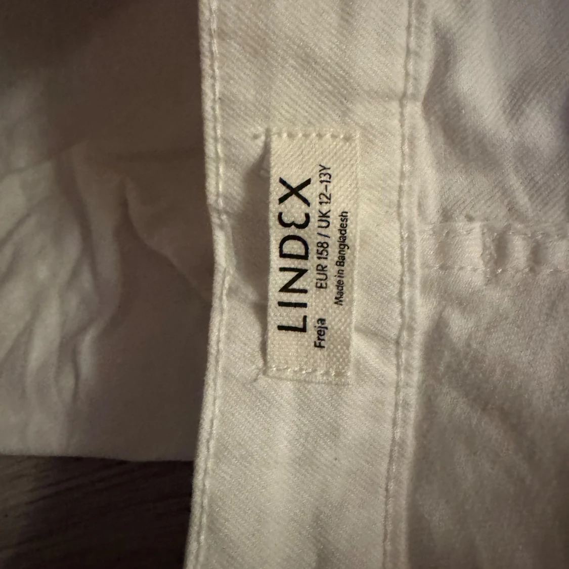 Vita bootcut byxor från Lindex - 2