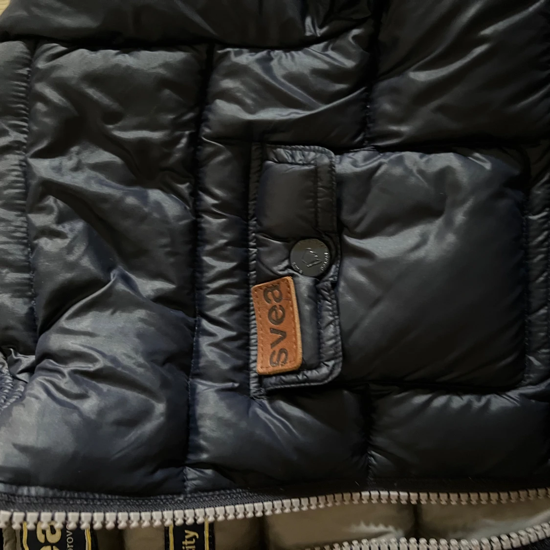 Svart pufferjacka från Svea, M - 3