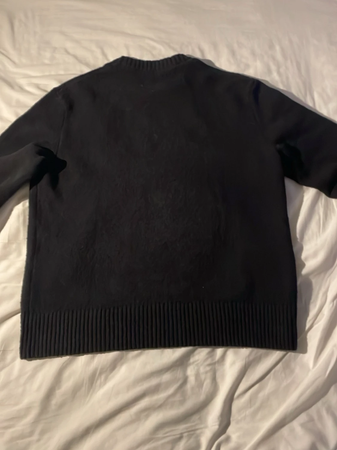 Svart stickad tröja. - 1