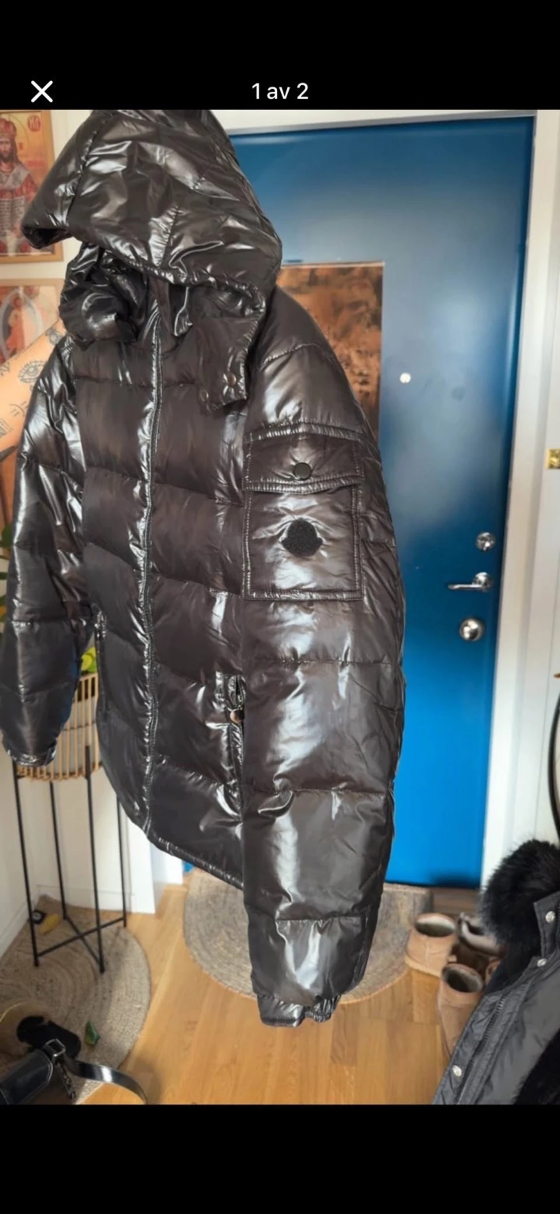 Svart pufferjacka med huva - 1