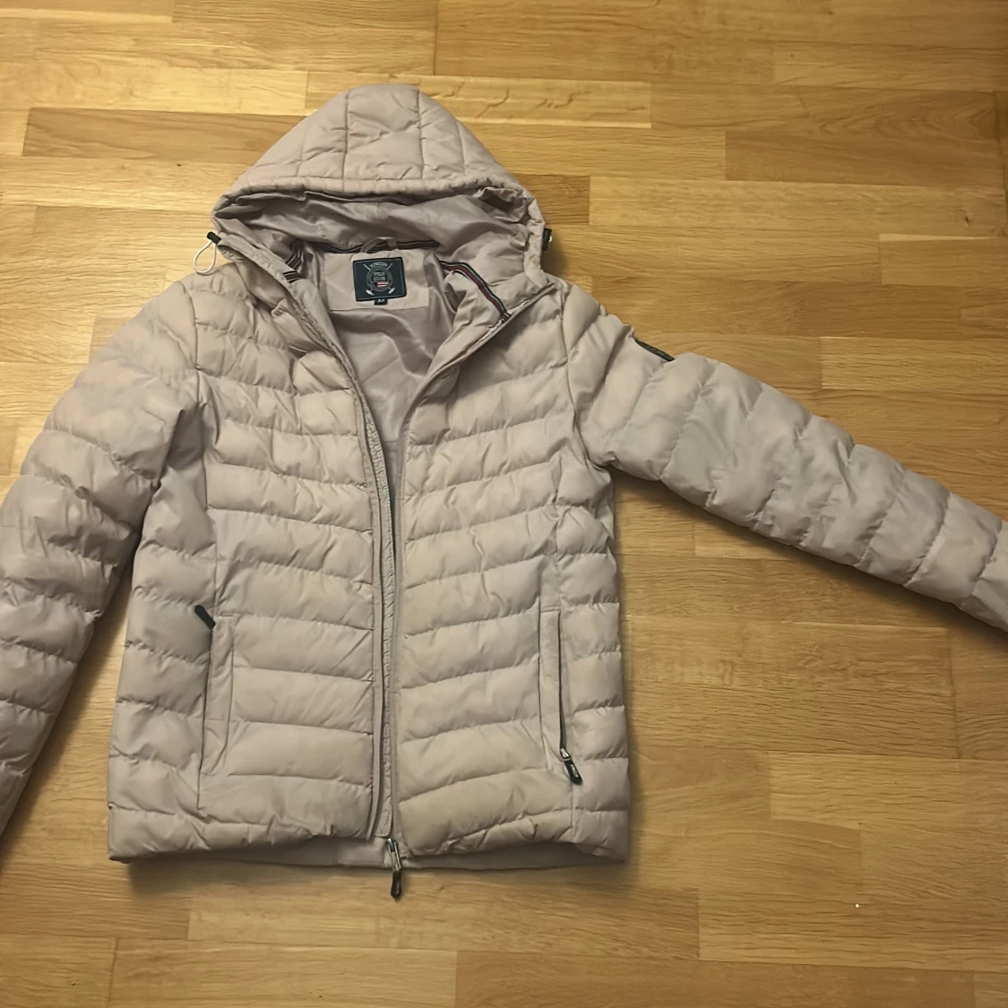 Beige pufferjacka från Vinson