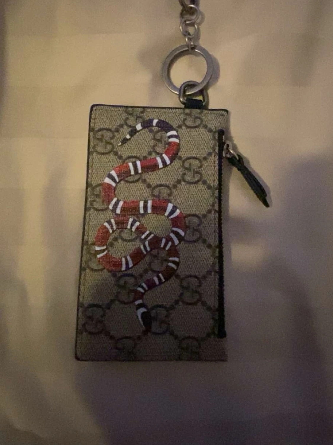 Beige plånbok med orm och monogram - 1