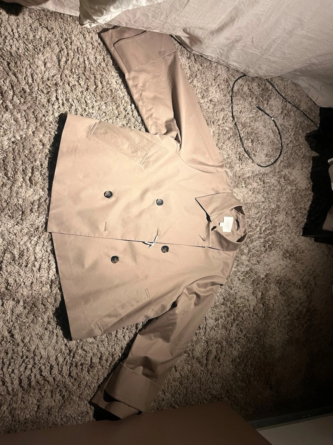 Beige kort rock med dubbelknäppning från dobber