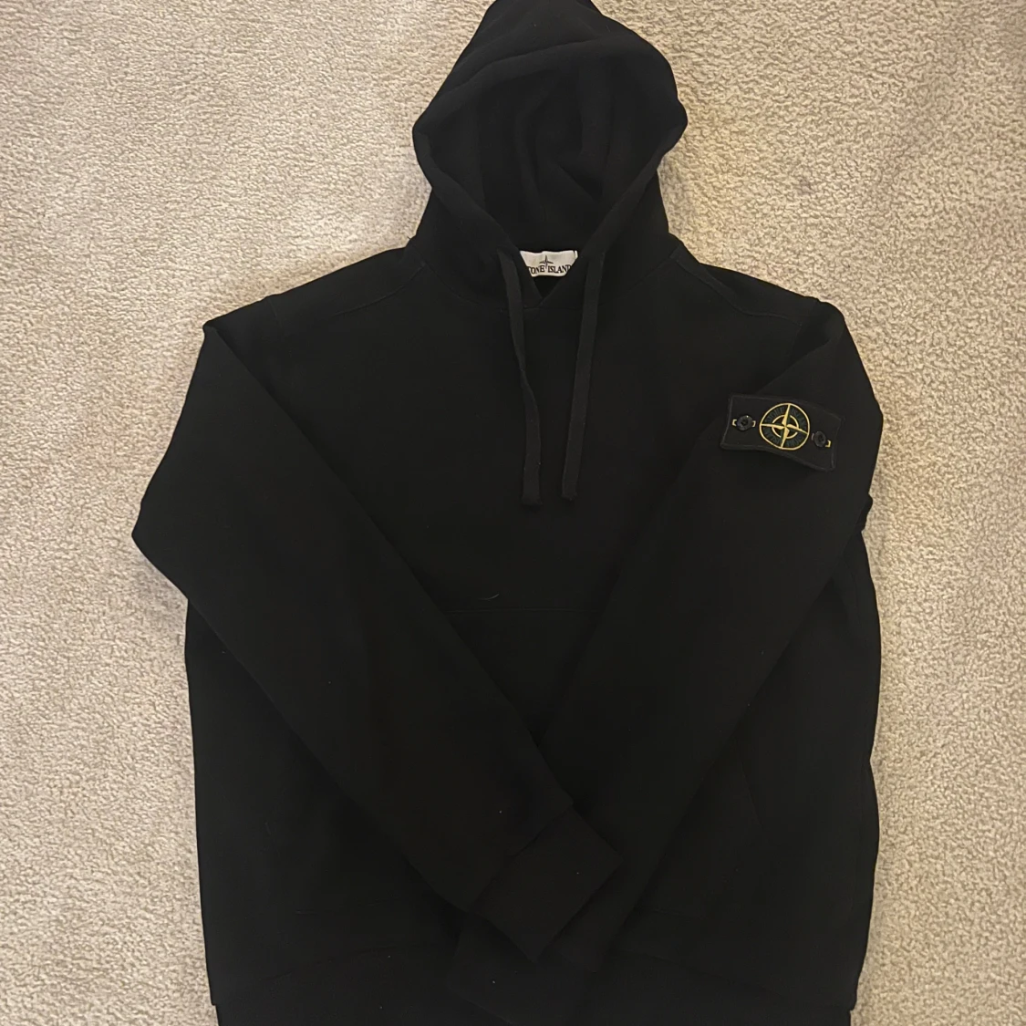 Svart hoodie från Stone Island