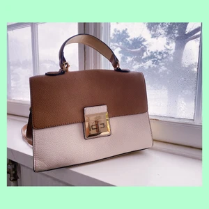 Faux Leather Handbag - The bag is big enough to fit an 11inch iPad, clasp is a little worn and so is the left top of the bag. Aside from that it is in good condition 7/10. Dm for more pictures, shipping not inc in the price <3