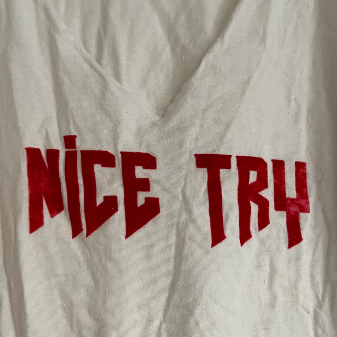 Vit T-shirt med Nice Try - 90