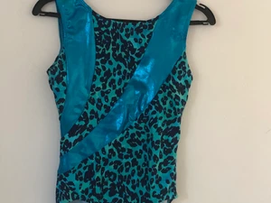 Gymnastikdräkt - Jättefin gymnastikdräkt, som ny, använd enstaka gång då den är något stor på mig 💙💙 skriv privat för exakta mått