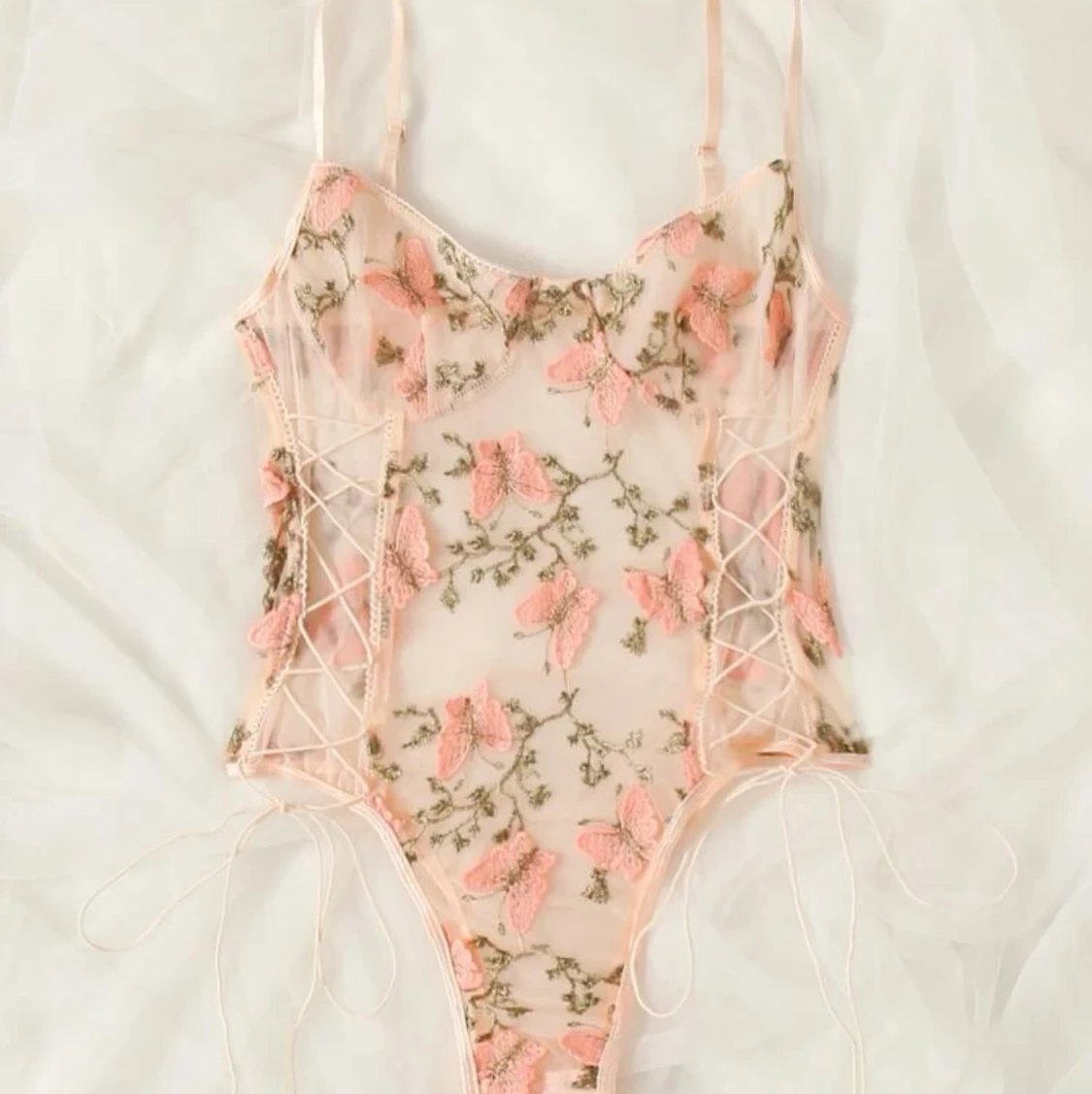 bodysuit med blommor