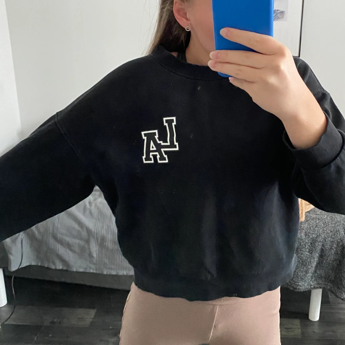 Svart sweatshirt GinaTricot