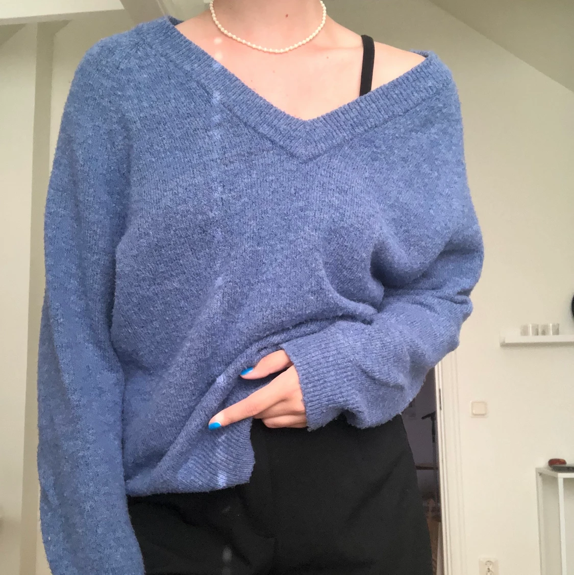 Blå stickad tröja